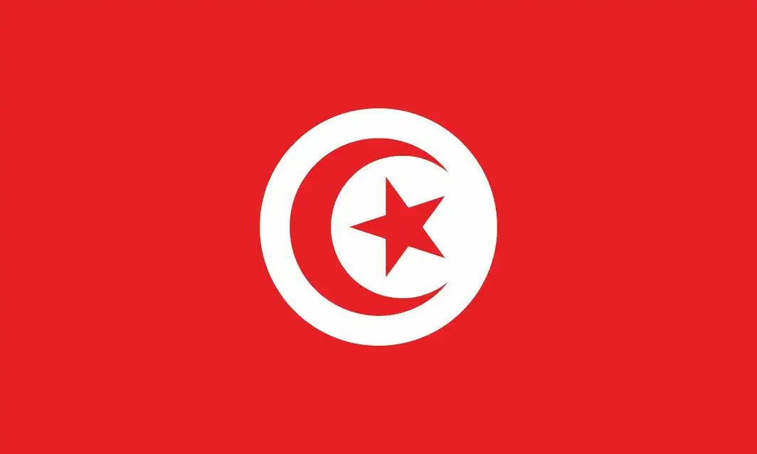 National flag of Tunisia - Tunisia’s flag—a red field bearing a central white disc containing a red crescent and five-pointed star—is among the oldest national flags still in continuous use, embodying Islamic symbolism and national resilience.